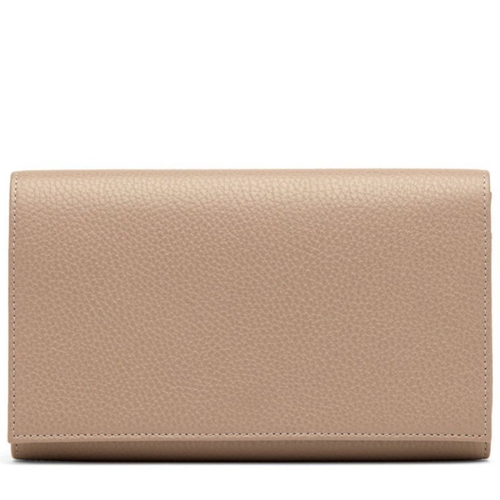 Cuyana pebbled pink leather travel wallet.